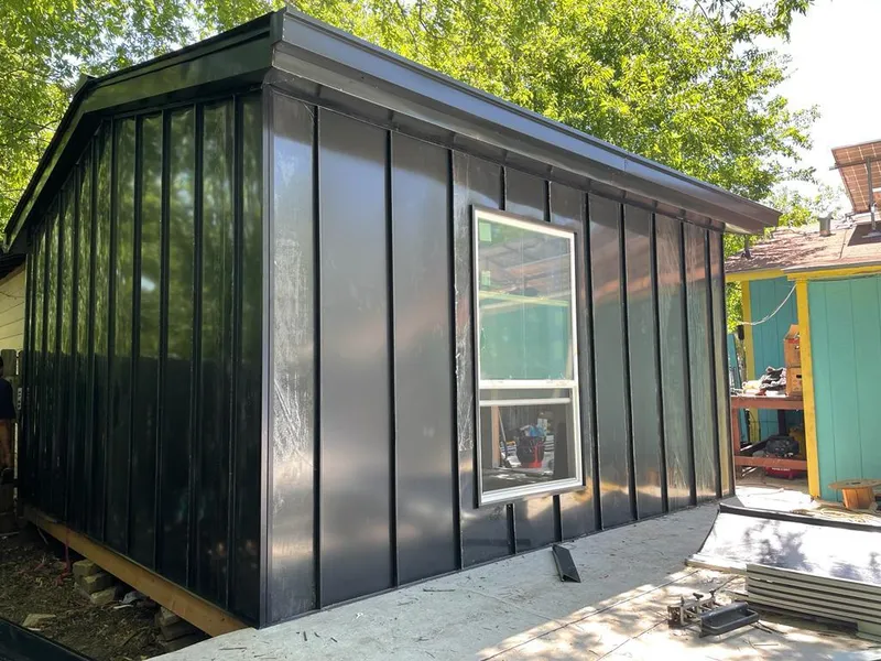 Black standing seam metal wall panels for Roof Inspection in East Windsor